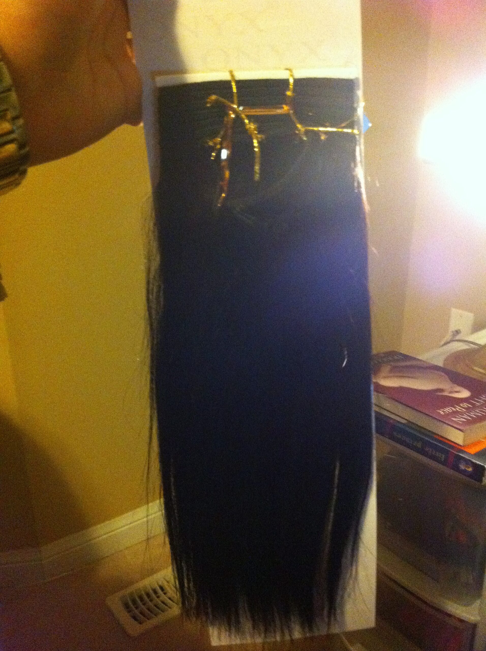 Bundle of premium human hair showing natural lustre